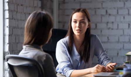 Client Discussing Needs With A New Ndis Support Coordinator During A Transition Meeting.