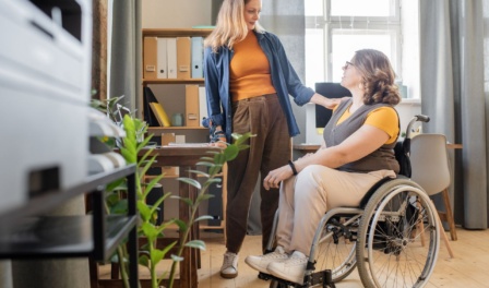 Support Coordinator Helping A Client, Illustrating The Rewarding Career Path As Part Of The Ndis.